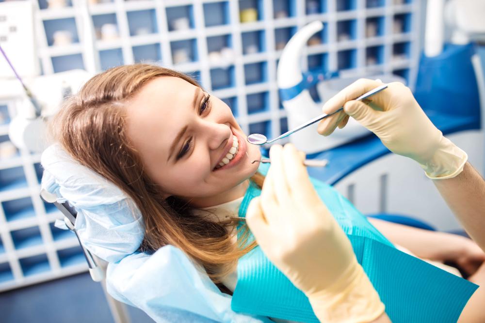 sedation dentistry dedham | woman at dentist