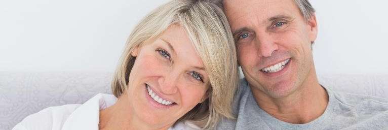 dental implants dedham | smiling couple