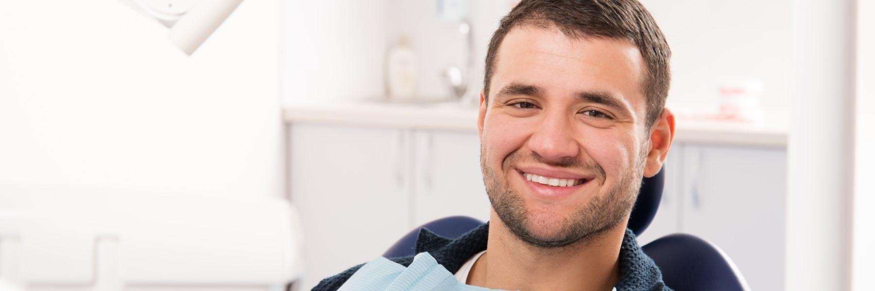 man at the dentist for root canal in dedham ma