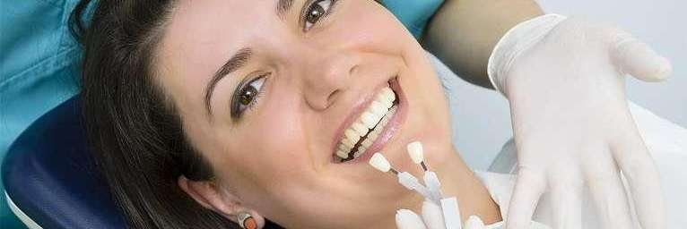 professional teeth whitening dedham | woman at dentist